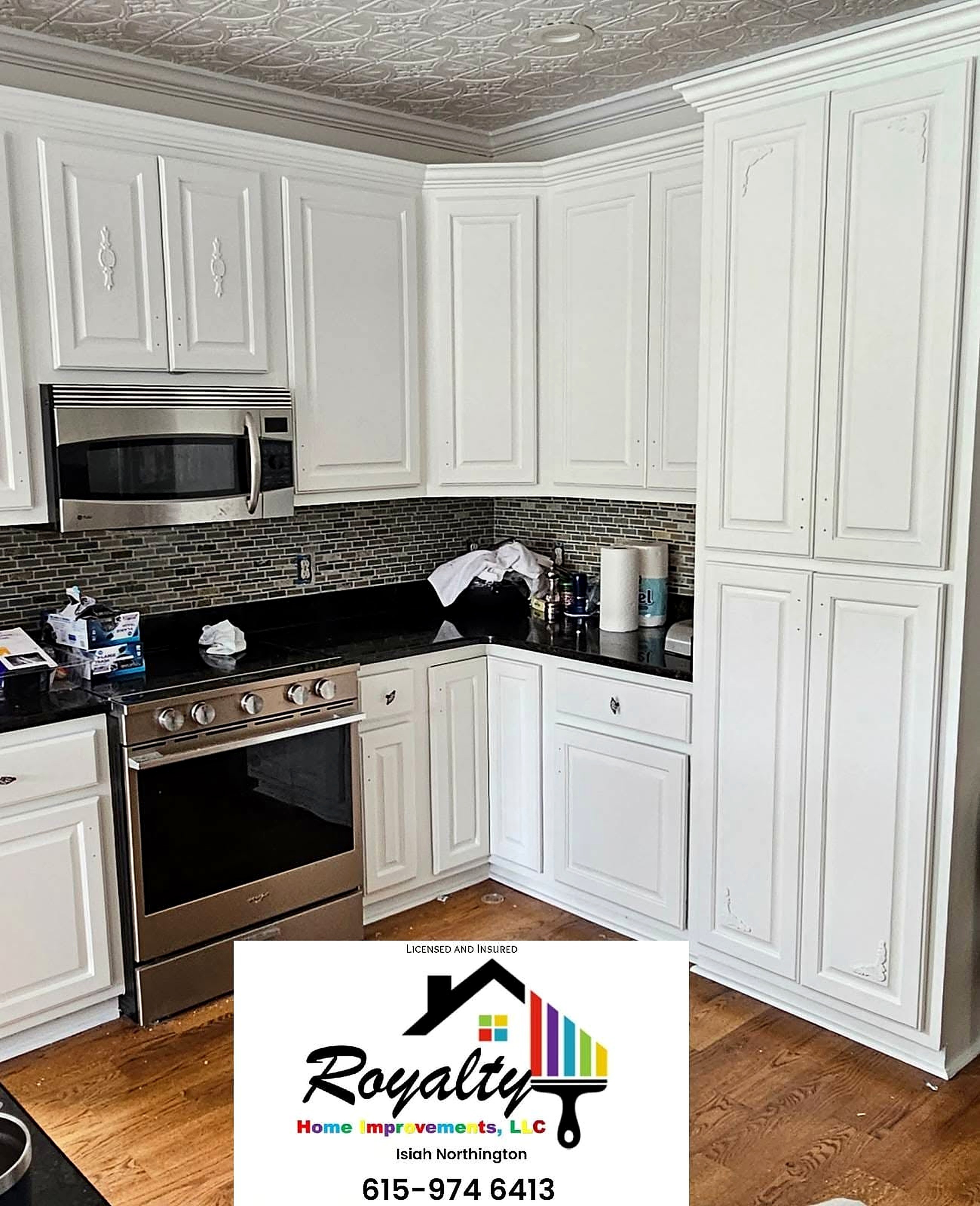 Kitchen with freshly finished white cabinetry