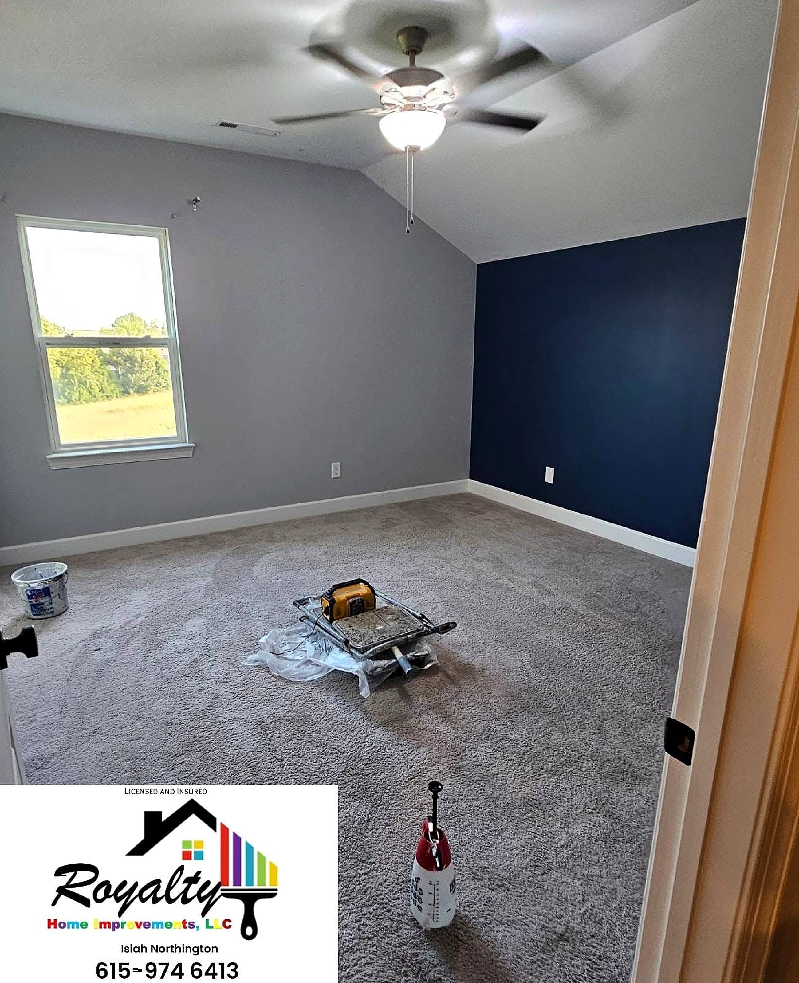 Two-tone bedroom with gray and navy walls