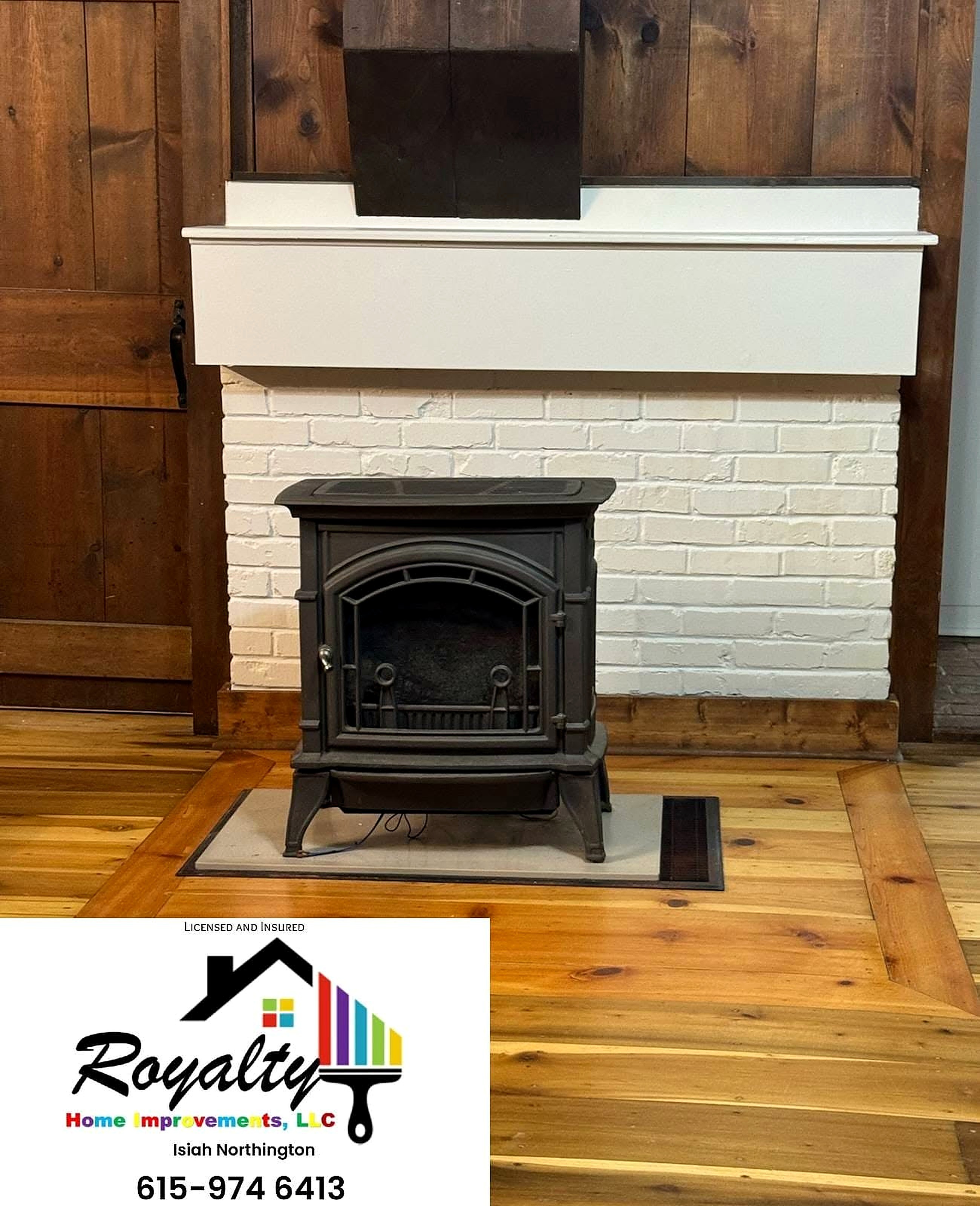 White-painted brick fireplace with restored wood floors