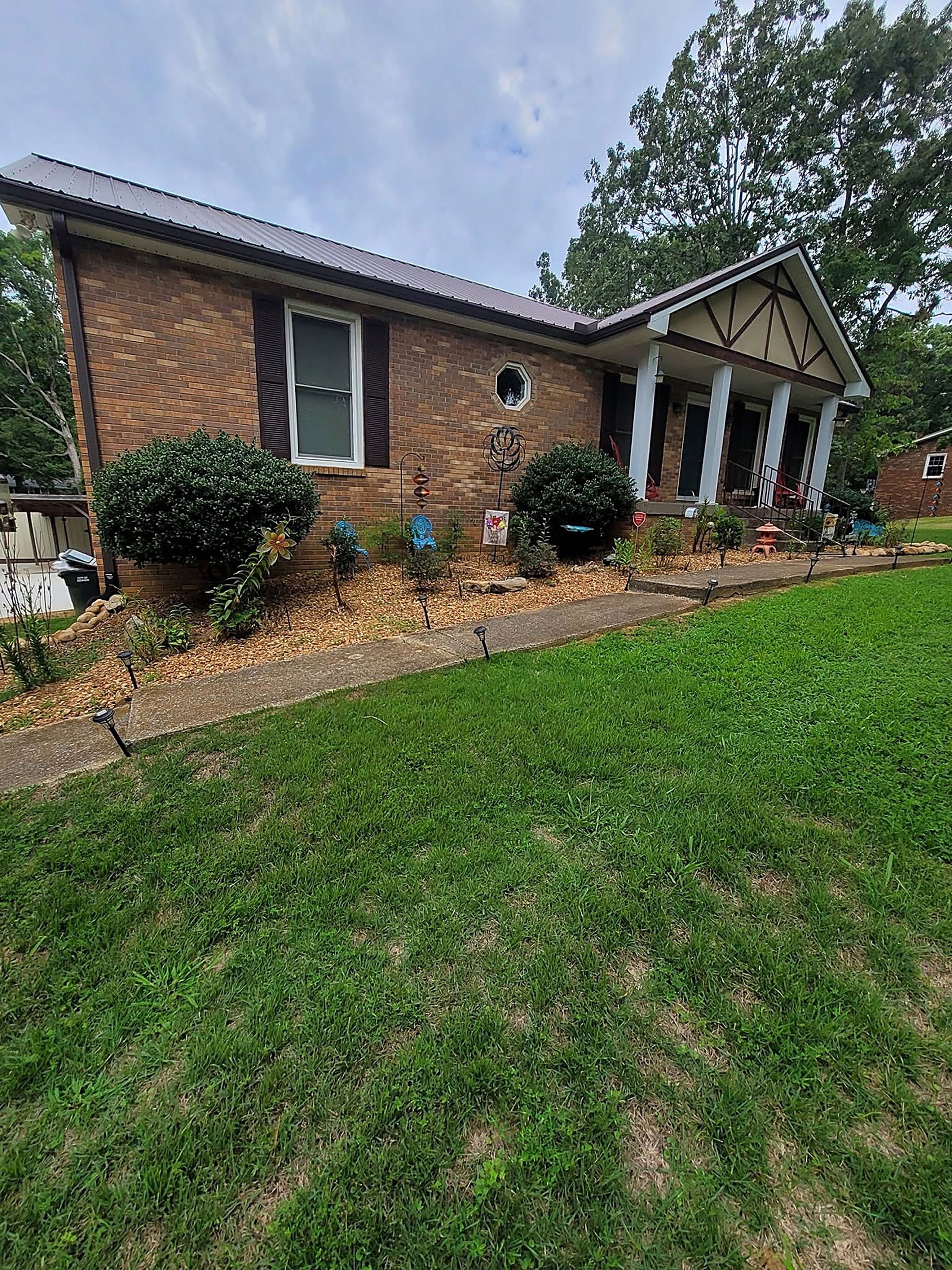 Brick house with freshly finished exterior trim