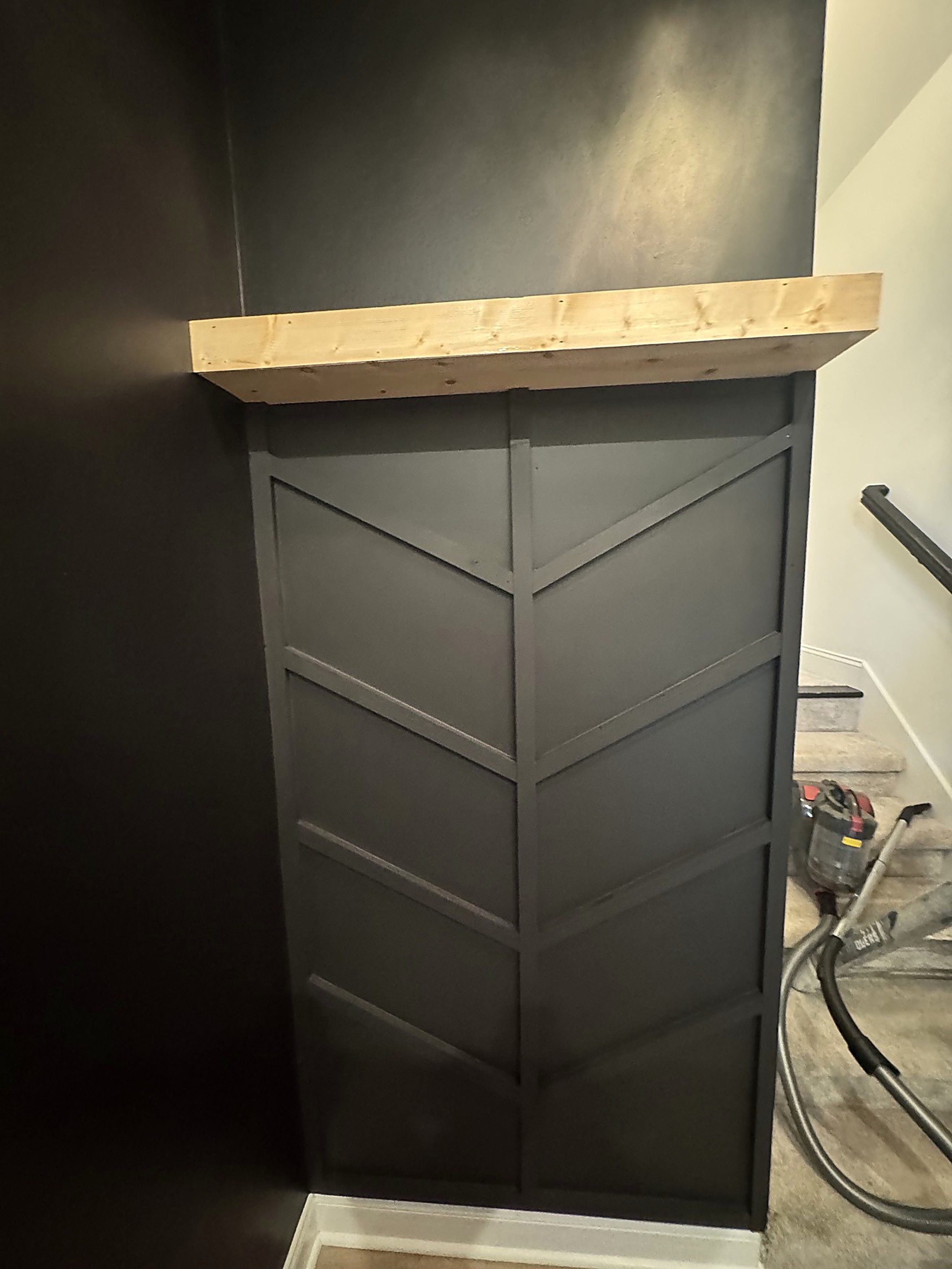 Freshly painted dark interior door with clean trim