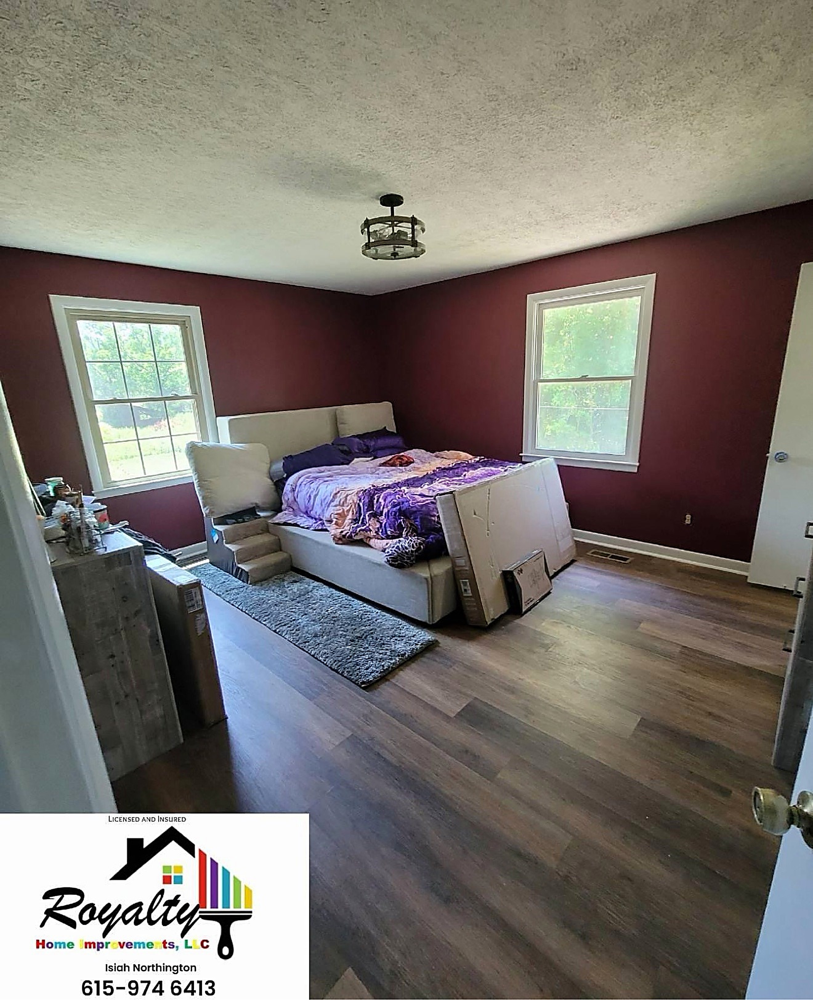 Refreshed bedroom with light walls and rich wood flooring