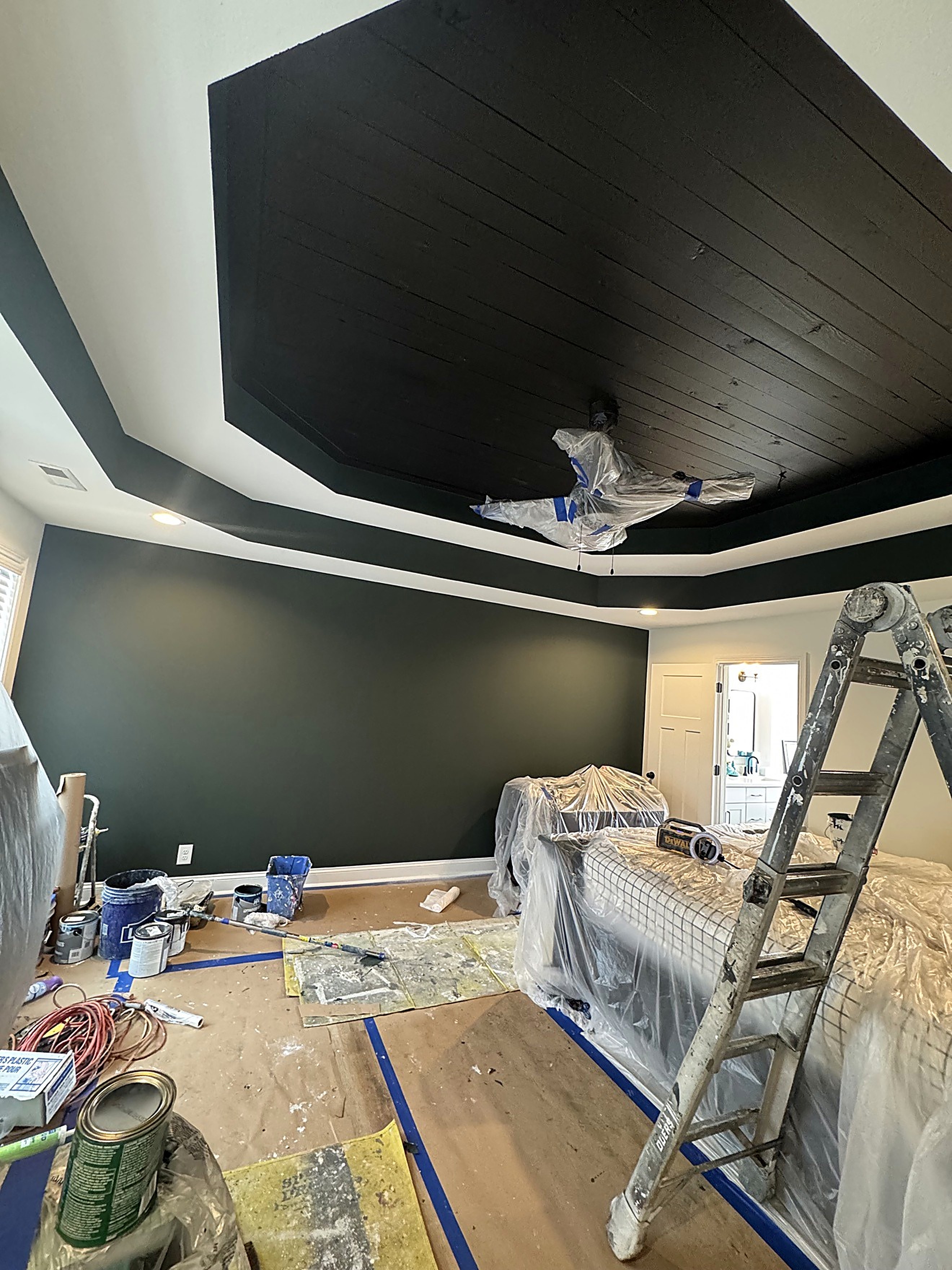 Freshly painted stairway with clean walls, ceiling and trim