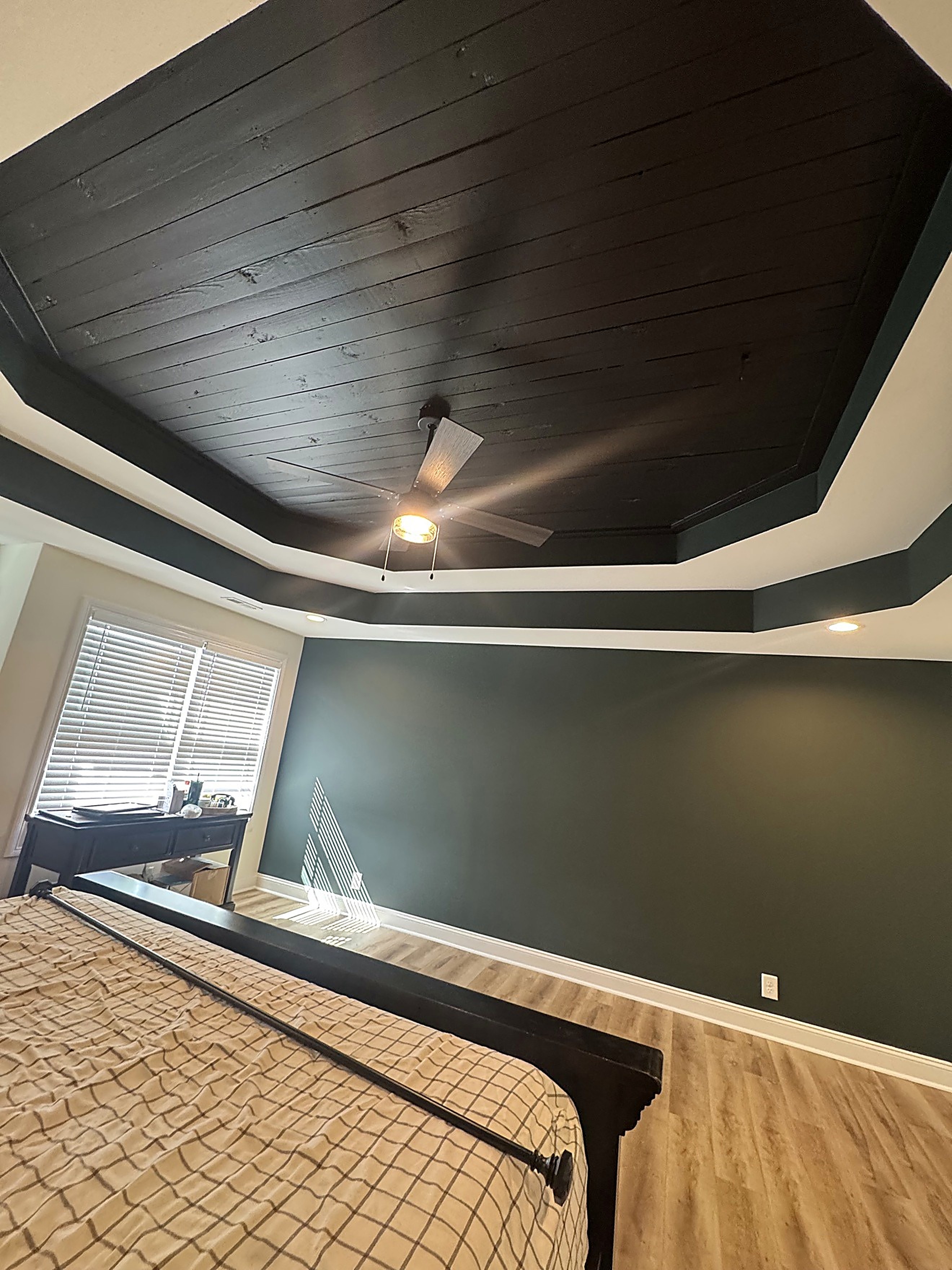 Finished hallway with smooth ceiling and crisp trim