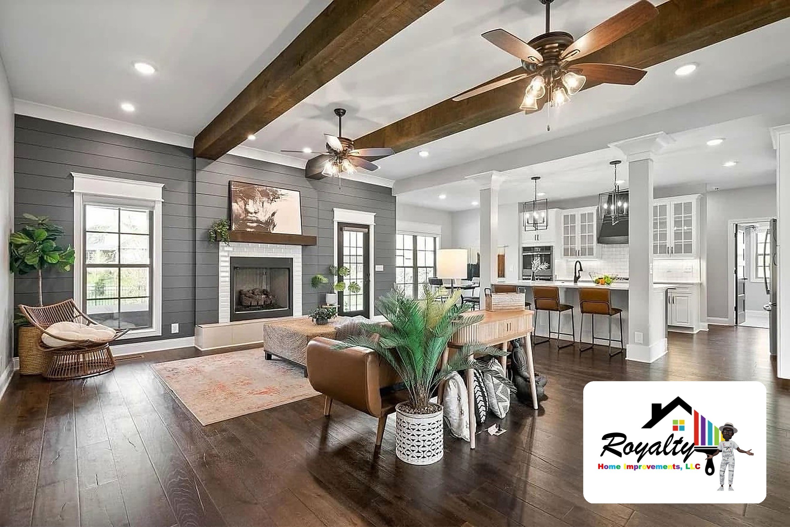 Open-concept living and dining space with vaulted wood-beam ceilings